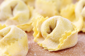 fresh homemade Italian filled pasta - tortellini or ravioli