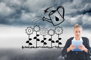 Composite image of front view of concentrated chic businesswoman