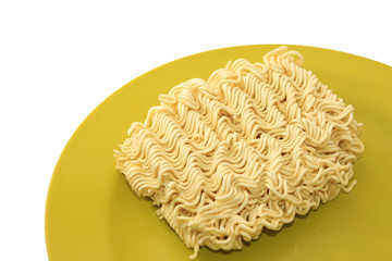 Instant noodle on a plate isolated on white