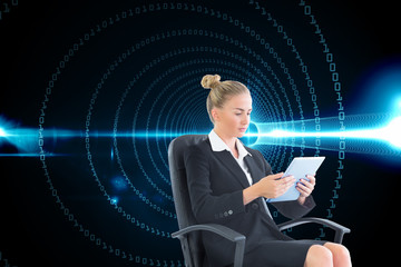 Composite image of businesswoman sitting on swivel chair with ta
