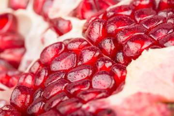 Pomegranate with its seeds close-up