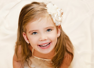 Happy adorable little girl in princess dress