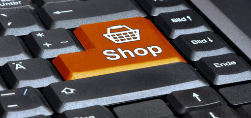 eks41 EnterKeySign - english: keyboard with orange key shop and shopping basket sign - German:...