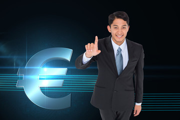 Composite image of smiling asian businessman pointing