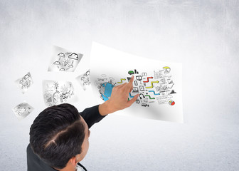 Composite image of asian businessman pointing