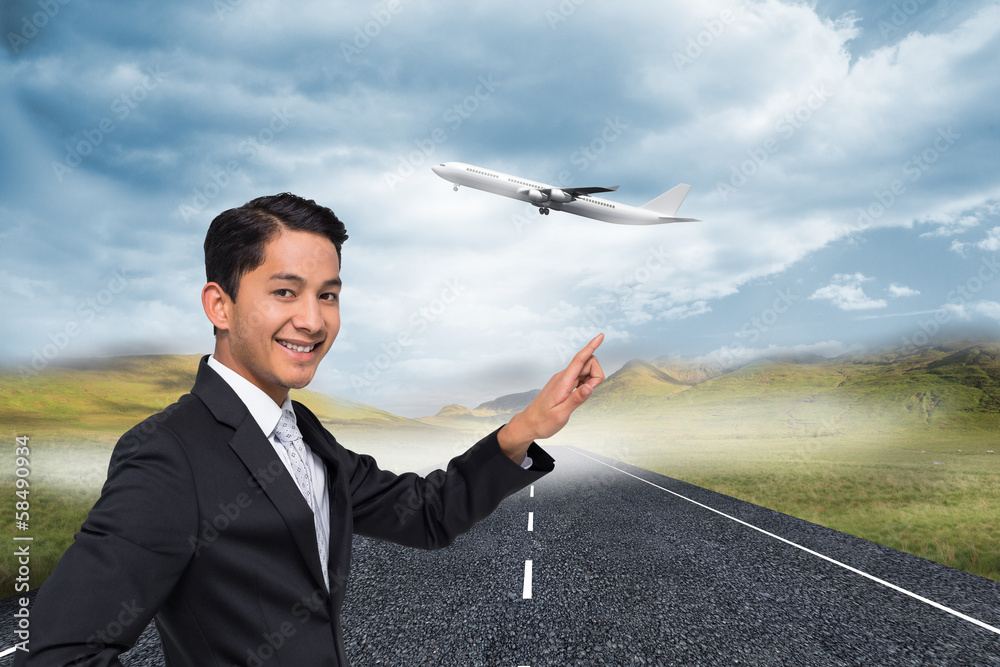 Poster composite image of smiling asian businessman pointing