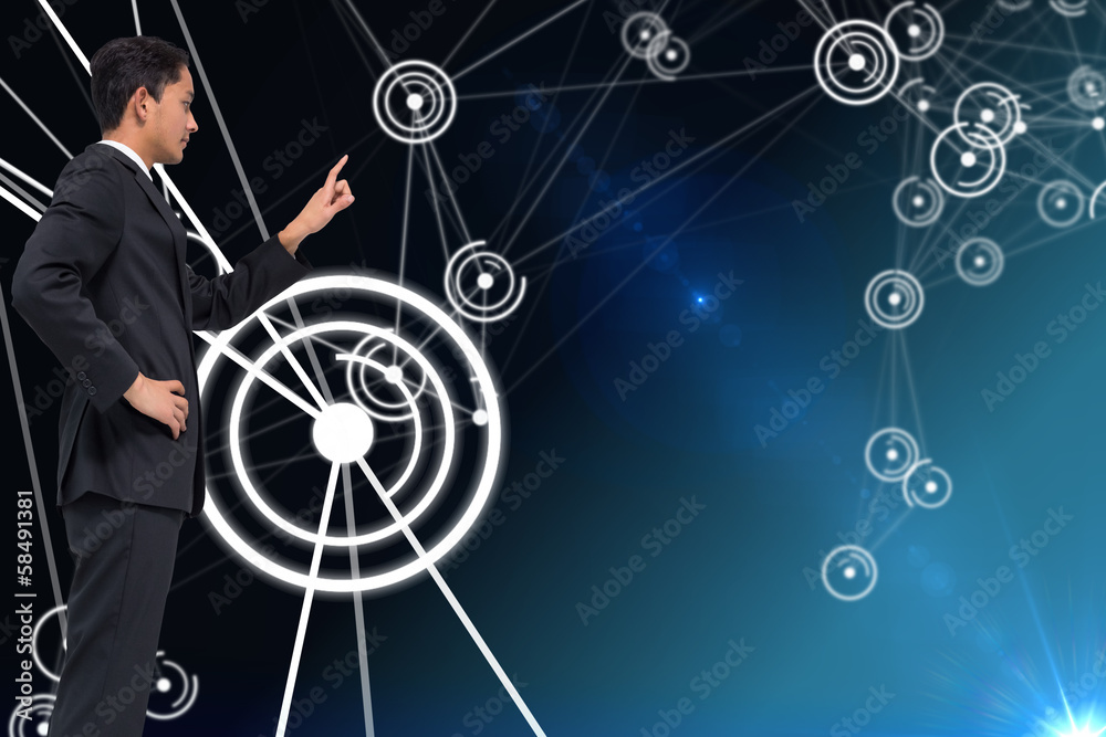 Poster composite image of unsmiling asian businessman pointing