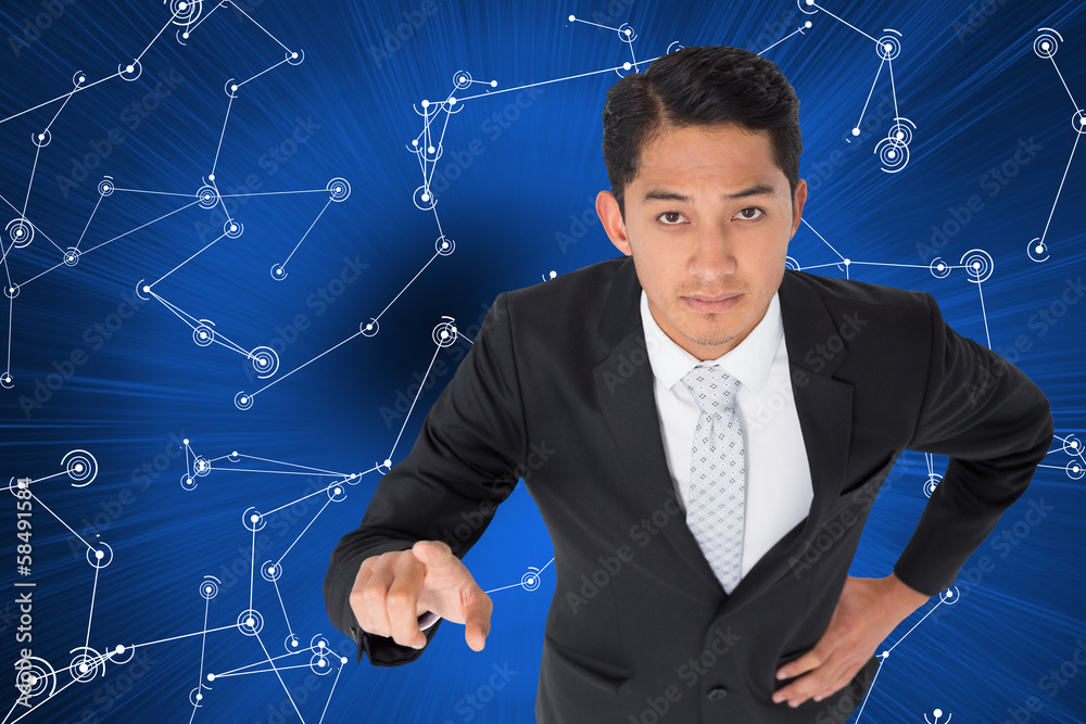 Poster composite image of unsmiling asian businessman pointing