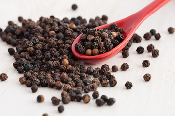 Black pepper grains close up