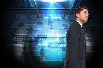 Composite image of serious asian businessman