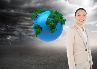 Composite image of smiling asian businesswoman