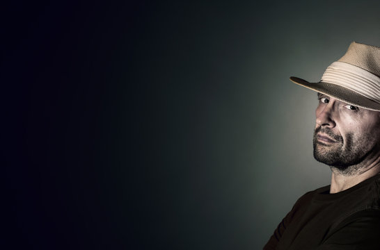 Portrait Of A Resolute Man Wearing A Panama Hat