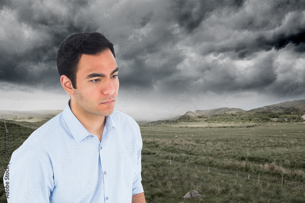 Poster composite image of unsmiling casual man standing
