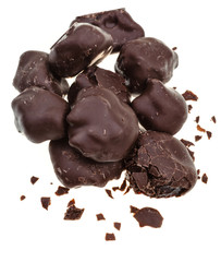 dried prunes in dark chocolate close up