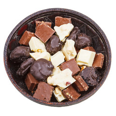 bowl with chocolate candies and broken bars