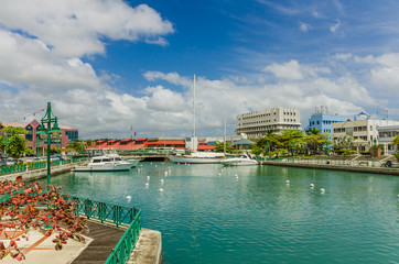 Boats Moored to the Quay at Bridgetown Harbour - obrazy, fototapety, plakaty