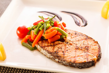 salmon steak with vegetables