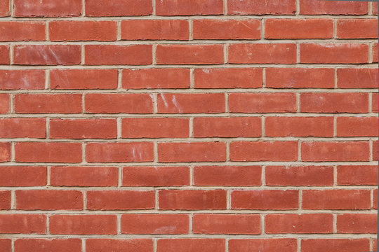 Muro di mattoni rossi