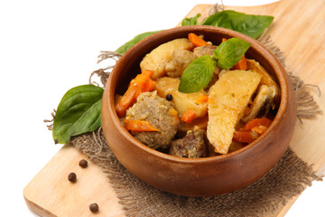 Homemade beef stir fry with vegetables in color bowl,