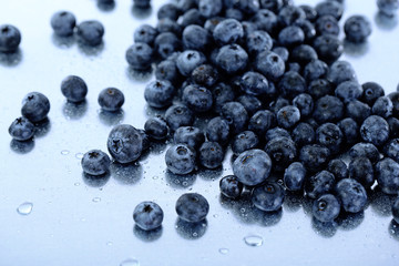 Blueberries on metal background
