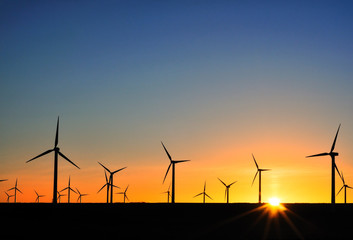 Wind turbines at sunset - 58502968
