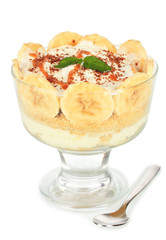 Delicious dessert with banana and caramel isolated on white