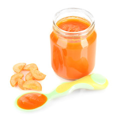 Baby puree with carrot isolated on white
