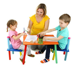 Little children drawing with mom isolated on white