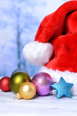 Composition with Santa Claus red hat and Christmas decorations