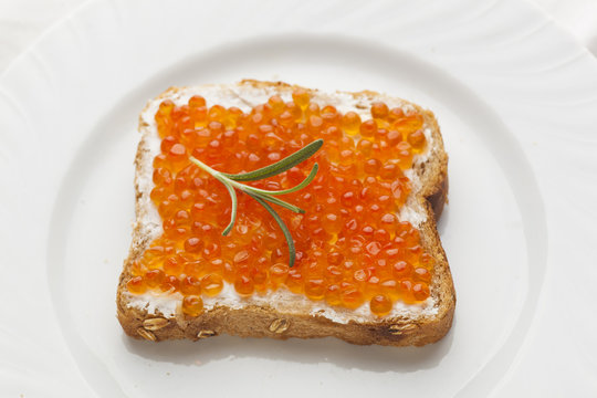 Luxurt Sandvich - Caviar and rosemary on bread