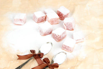 Tasty oriental sweets (Turkish delight) with powdered sugar,
