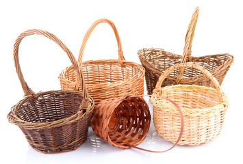 Empty wicker baskets, isolated on white