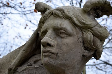 Fototapeta na wymiar The head of an old sculpture in Antwerp, belgium.