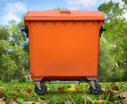 Orange garbage bin