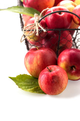 Fresh apples in metallic bucket isolated on white