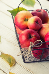 Fresh apples in metallic can