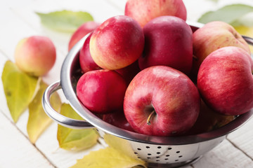 Fresh apples in metallic can