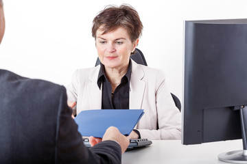 Boss talking to candidates