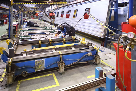 The process of welding body of the wagon by worker
