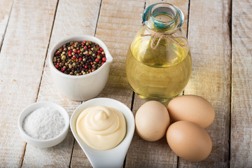 Mayonnaise in bowl on table