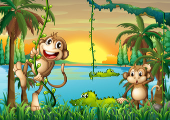 Obraz premium A lake with crocodiles and monkeys playing
