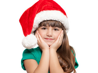 Isolated portrait of a little girl in a Christmas hat
