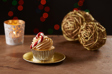 Candy bar cupcake on Christmas background