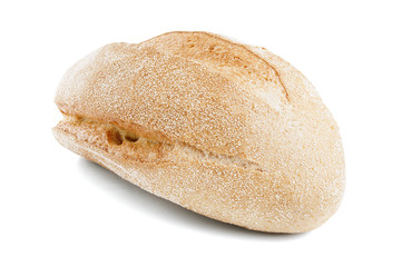 freshly baked loaf of cornbread on a white background