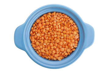 Bowl of red lentils isolated on white background