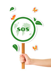 Hand holding sos green planet sign