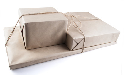 pile parcel wrapped with brown kraft paper and tied with twine