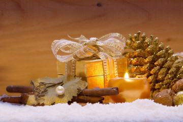 Fototapeta na wymiar Golden Christmas decoration and gift. 