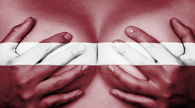Hands covering breasts