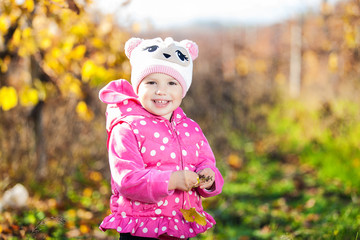 cute girl have fun in autumn vineyard